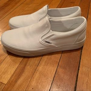 Vans white slip ons
